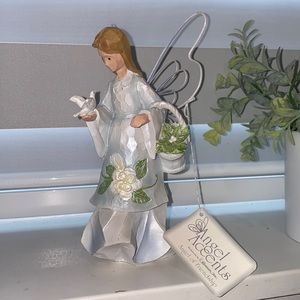 Angel holding flowers dove accents Roman inc Angel of friendship 2001 #74691